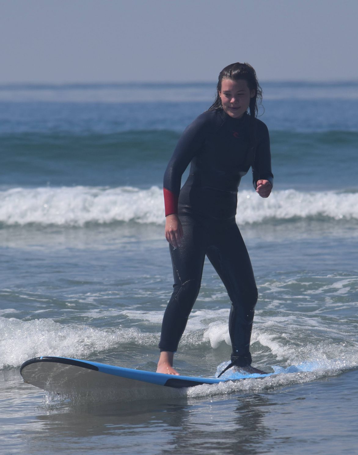 new student paddling in the water