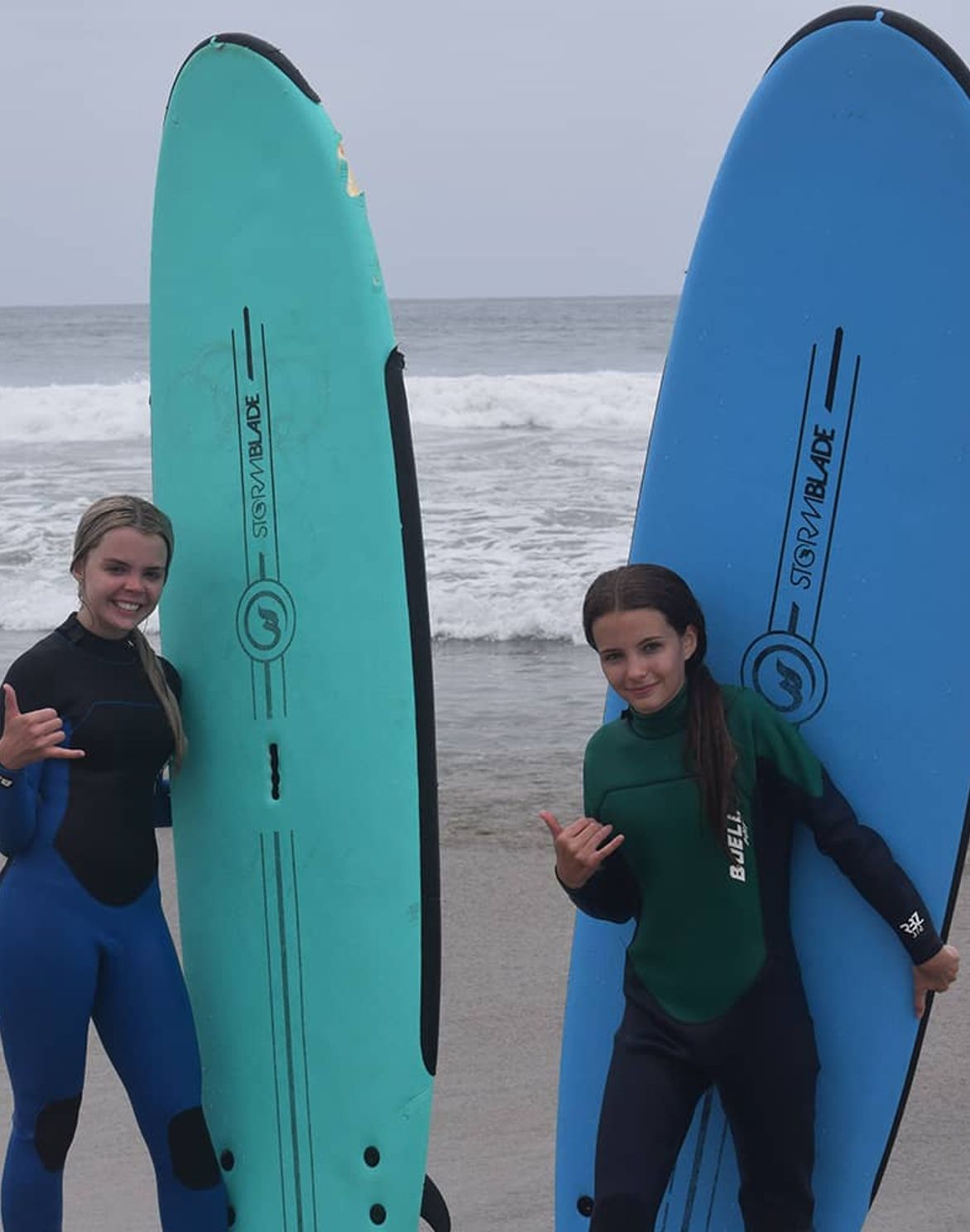 Kids learning to surf during camp